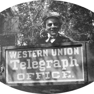 Telegraph boy & sign