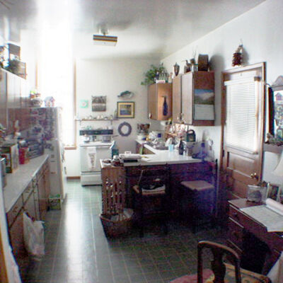 The SDHC archvies when the space was an apartment, circa 2005: CD includes photos of the Old School House apartments before the site was re-imagined at the Saugatuck-Douglas History Center. There are also memos and plans for the Old School House restoration project