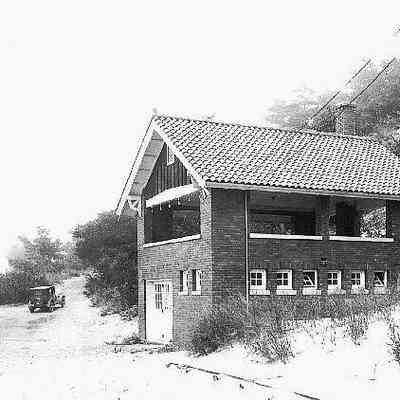 Photo from the book: two beachouses that once were on the shore and access road