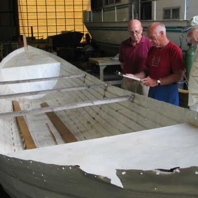 IMG_0179: Dean Batchelor, Dick Lyons and Al Lyon review half completed plans July 2005.