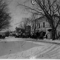          89-1-40 Butler Street no.jpg 512KB; Niles Jewelry shop sign on the side of Leland's Dept. Store. Winter 19?2 with horse-drawn sleighs parked along the street.
   