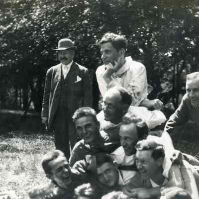 pile of people.jpg 4.1MB: Clute standing at far left