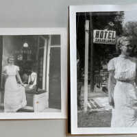          5-6; Ann Diepenhorst in a long lacy gown posed in front of the Jeune Fille [young girl, fair maiden] dress shop. Handwritten note on photo back 