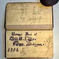 Claude A. Ellis account book