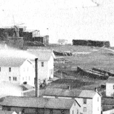 1874 - Inset is the George M. Case being completed in the Martel Yard. The hull was built by Martel in Allegan and somehow pulled downriver for completion. The open waterfront area - seen here also in 1874 - is the area occupied by the Martel Yard in later years.: filename: 1874 Birdseye Butler south end