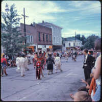          Page E, 4. Marchers in Native American attire, same parade as E1
   
