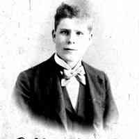          89-1-79 Allen Falconer.jpg 468KB; Allen Falconer - Studio vignette of young man in suit with bow tie, circa 1900
   