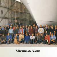          close up of back cover depicting workers from the Saugatuck yard
   