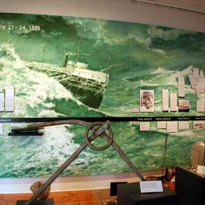 Chicora_exhibit.cWallRight.jpg 809KB: This dramatic painting envisioning the Chicora at the height of the storm was done by Randall Higdon of Coloma, MI specially for the Saugatuck-Douglas Historical Society's 2002 exhibit. In 2012, the painting was reproduced as a 47'-long panoramic mural to covers one wall of the Society's boathouse pavilion located behind the Old School House.
