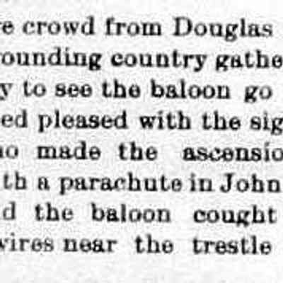 cr1904052704BaloonistParachutes.jpg: balloon ascension parachute lands in John Priest's yard, balloon tangled in trolley wires near trestle