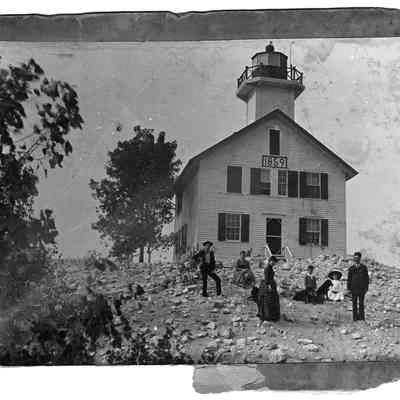 Lighthouse - Bakers pose.jpg 1.2MB: 2 1/2 square vignette instructions on edge - image of Baker family at Kalamazoo lighthouse with 1859 date on building.