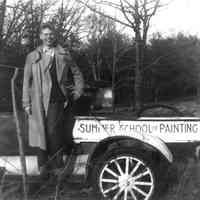          file747.jpg 220KB from 2021.72.02; smiling man in trench coat standing on Summer School of Painting truck
   