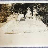 Five women posed on a parade float