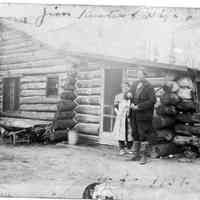          89-1-279_B_Cabin_1937.jpg 476KB; Jim Rasten? Rastar? and wife at Fife Lake
   