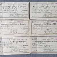          Checks from the Treasurer of the Village of Douglas March and June 1899; Signed by George H. Plummer, president and L. W. McDonald, clerk
Paid to J.E. Durham, J.H. Kibby, James Reed, Ward Reed, F. Kerr, C.P. Ludwig for street or 