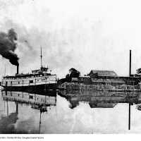          The “Charles McVea” fruit freighter approaches Douglas Basket Factory ca.1900.; 95_21_1aa_Stmr_C._McVea
   