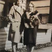          Marguerite Cox? and Bea Finch; in front of Margurite's home next to Drug Store facing Mason St.
   