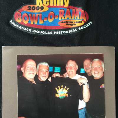 Nametag graphic on front of shirt plus a photo of the team