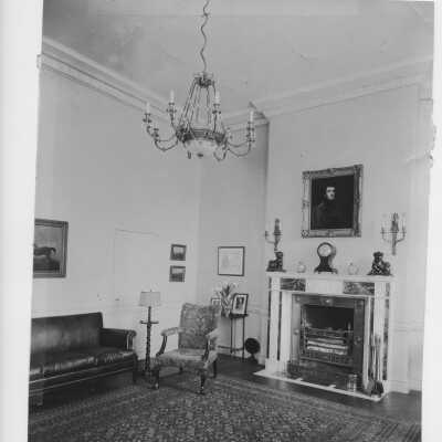 Hammond Mansion Living Room with Fireplace and Painting