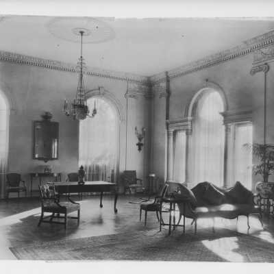Hammond Mansion - Photo of Interior Room with Table and Chandelier