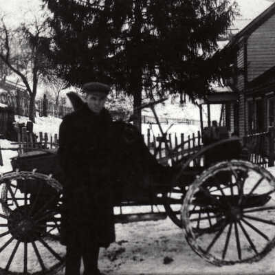 Joseph Franklin McCracken [1871-1945] with first car he sold