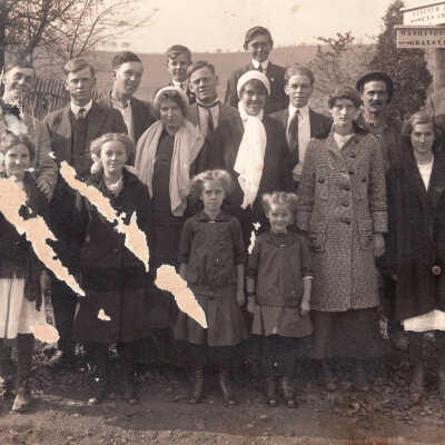 Clutter family and friends standing at an intersection near the Greene and Washington County, Pennsylvania border