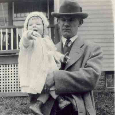 Charles Russell Adamson [1900-1962] holding his daughter, Clara Lou Adamson