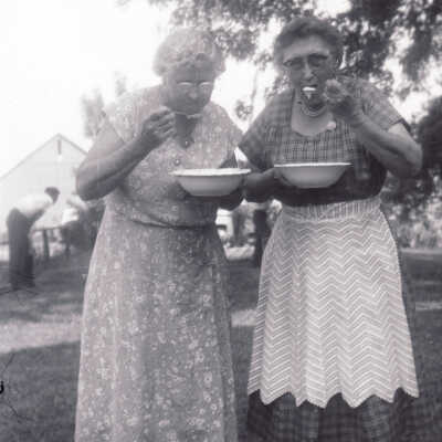 Lillian Frances (Supler) Swart [1886-1969] and Nancy Wynes [1890-1979] eating ice cream