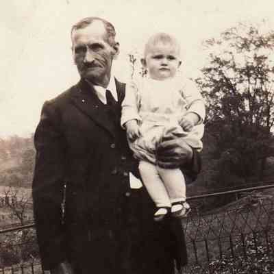 Franklin Pierce Headley holding his grandaughter Arabelle (Wheatley) Buckbee
