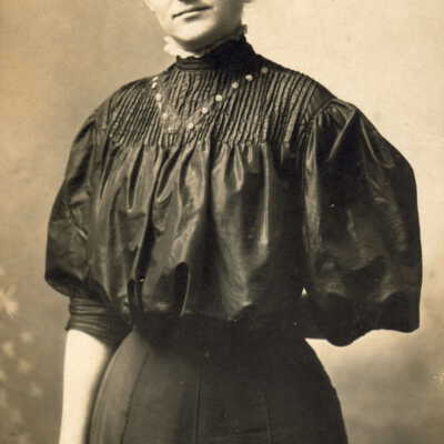 Inscription on reverse of image reads, "Nellie Weaver."
