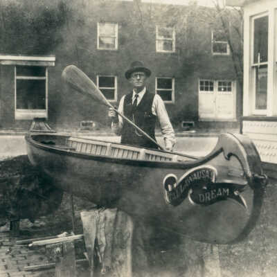 Joseph Warren Jacobs in front of the Jacobs home at the east corner of First and Washington Streets, Waynesburg, Greene County, Pennsylvania