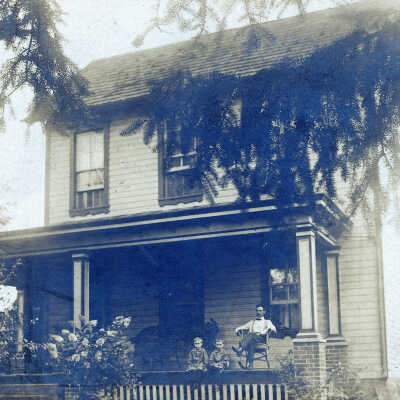 John Ewing Baily with his twin sons at their home in Carmichaels