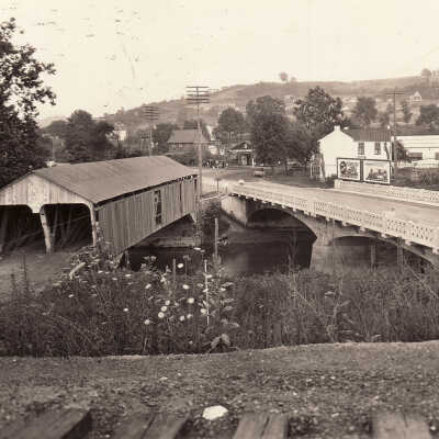 Double-lane covered bridge beside Freedom Bridge on Greene Street