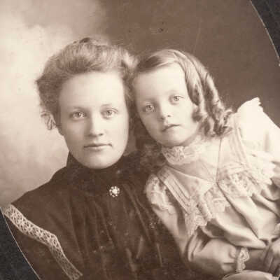 Unidentified young woman and boy