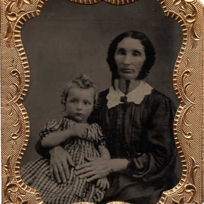 Sarah Inghram (Thockmorton) Harvey [1829-1902] holding her daughter Alice Isabelle (Harvey) Fisher [1855-1921]