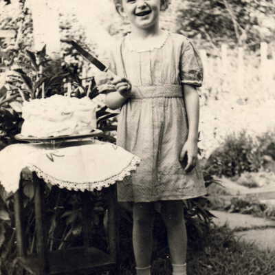 Glennetta Ann "Peanuts" (Leasure) Sappington with birthday cake