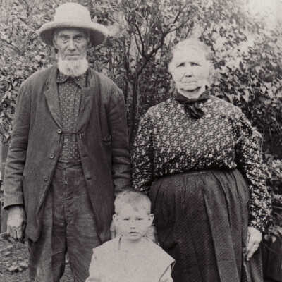 William Fletcher [1828-1922] and Nancy (Stewart) Fletcher [1832-1919] with their grandson Edward D. Fletcher