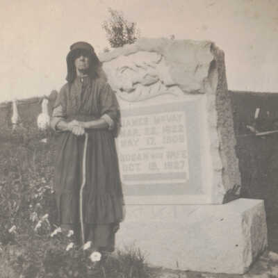 Susannah (Neal) McVay at the tombstone of her husband James McVay in McVay Cemetery, Aleppo Township