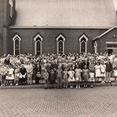 First Baptist Church congregation celebrating the church's 100th Anniversary