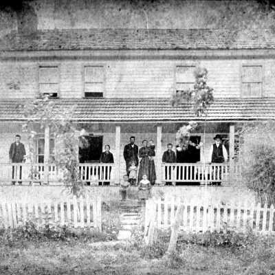 Robert Watson and Catharine (Anderson) Watson family in front of their home