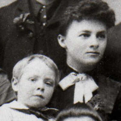 Eleanor Orissa "Nellie" Dwigans holding Delbert Adams