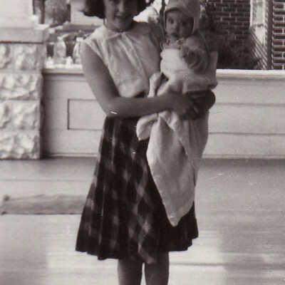 Loralyn (Buchanan) Walker holding John Lee Buchanan: Origformat: Print-Photographic