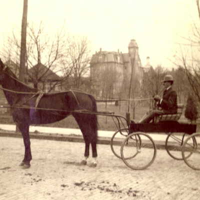 Eleazer Luse Denny [1865-1910] riding north on Richhill Street