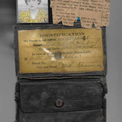 Wallet and contents, preserved as last used by Edward McNicholas, Private First Class, Company K, 110th Infantry, 28th Division