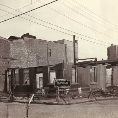 Citizens National Bank Construction Album (Selected Photo 24) - Buildings being torn down to make room for Citizens National Bank