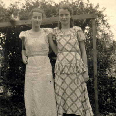 Rachel (Livingood) Jones and Sara (Livingood) Buchanan with family dog "Laddie"