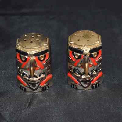 Vintage bronze totem pole eagle salt and pepper shakers. Made in Japan.