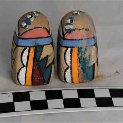 Back and size comparison of pottery shakers.