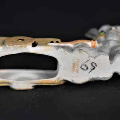Marked "Made in Japan" and "69" on the bottom of the donkey piece.