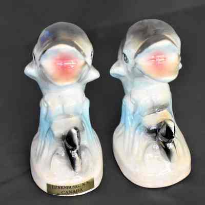 Front of dolphin shakers with label.